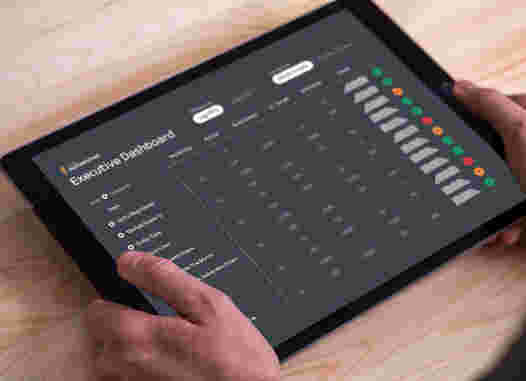 Image of dashboard on ipad in hands