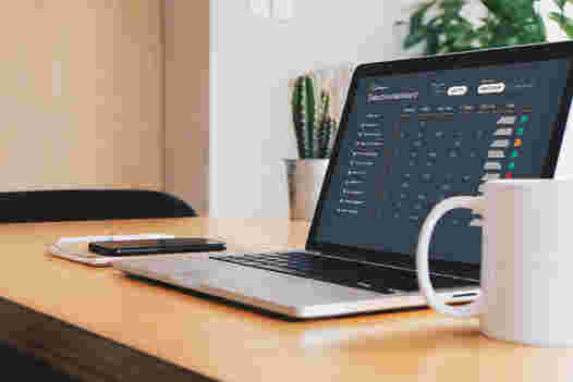 Image of Ignite C-Suites dashboard on a laptop